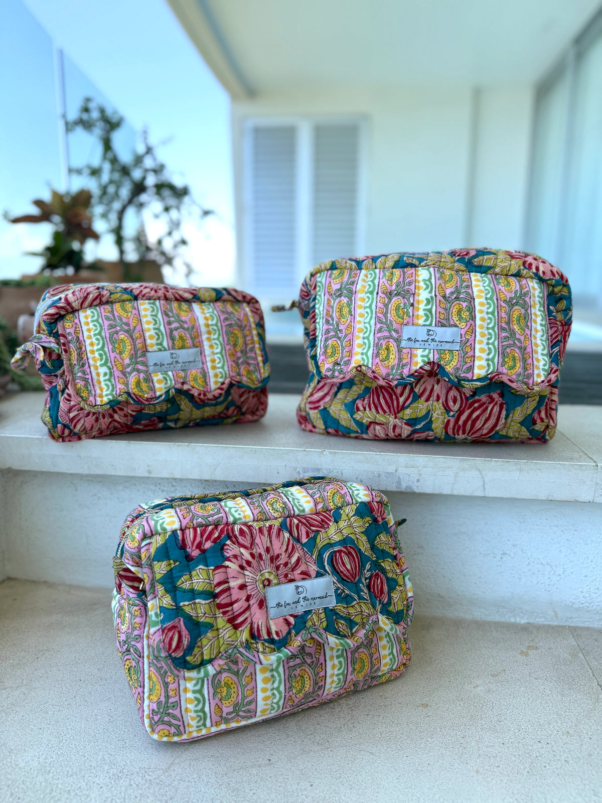 blue and red travel bags - the fox and the mermaid