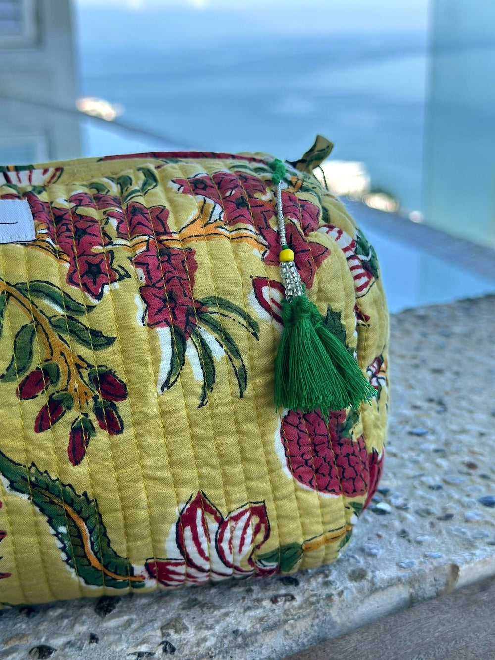 tassel detail on yellow cosmetic bag - The Fox and the Mermaid