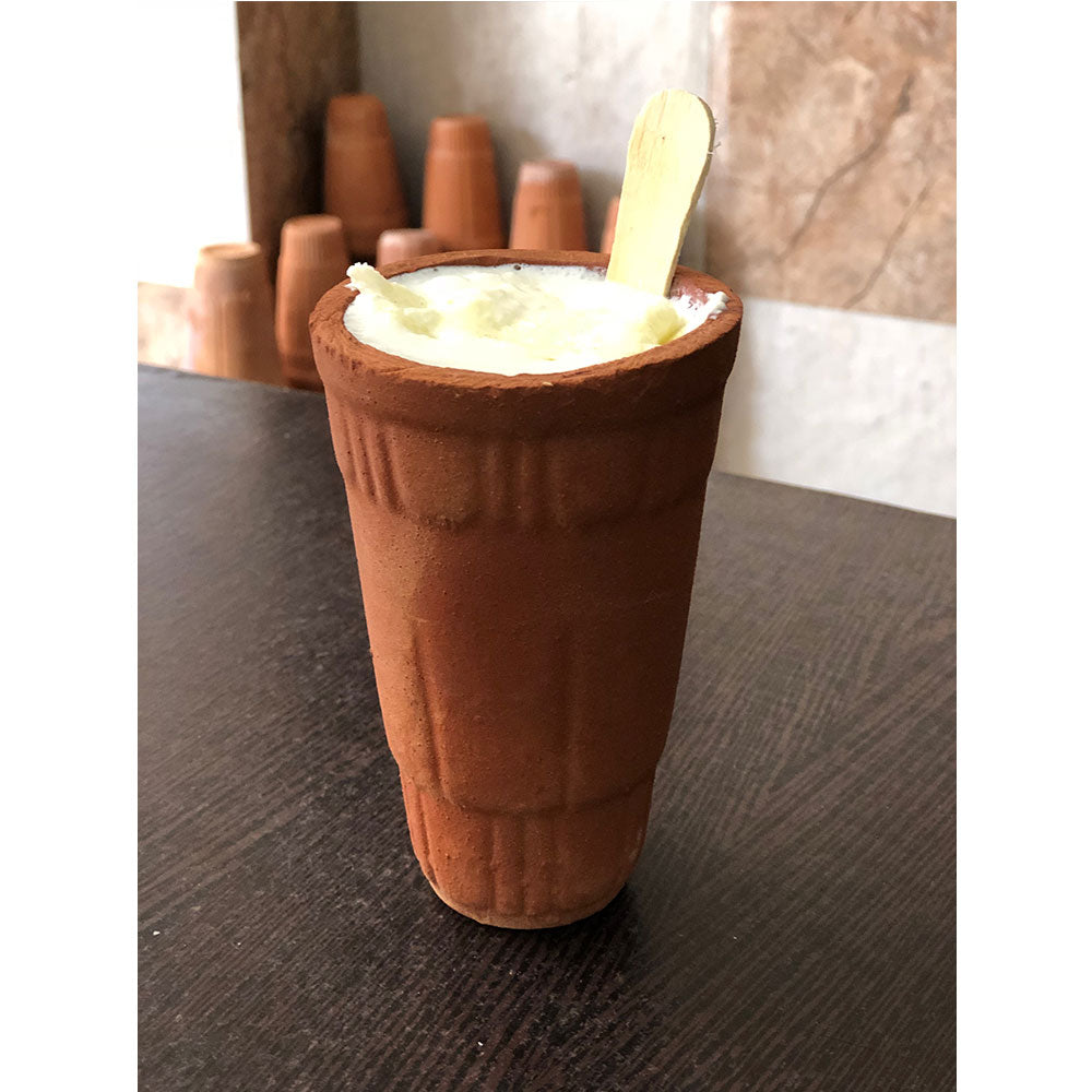 Traditional Indian Lassi in a Terracotta Cup The Fox and the Mermaid