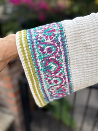 detail of block printed sleeve on robe