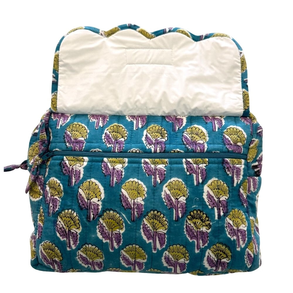 zippered pocket on front of quilted makeup bag