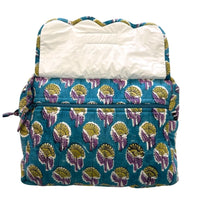 zippered pocket on front of quilted makeup bag