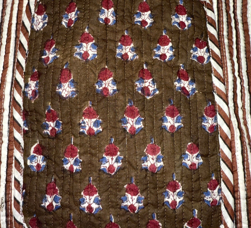 red and brown block print details
