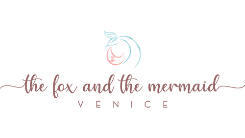 the fox and the mermaid logo