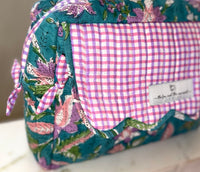 zippered organization bag with scalloping and decorative ruffle ties