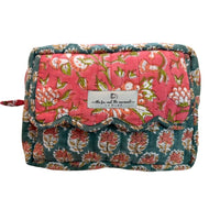 Hand block printed toiletry bag set styled for vacation and travel essentials