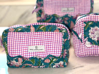 green and pink toiletry bags big enough to hold full size bottles