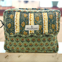 block printed green travel bag with scalloping and ties