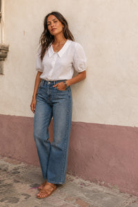 white button down linen top with short sleeves and rounded collar