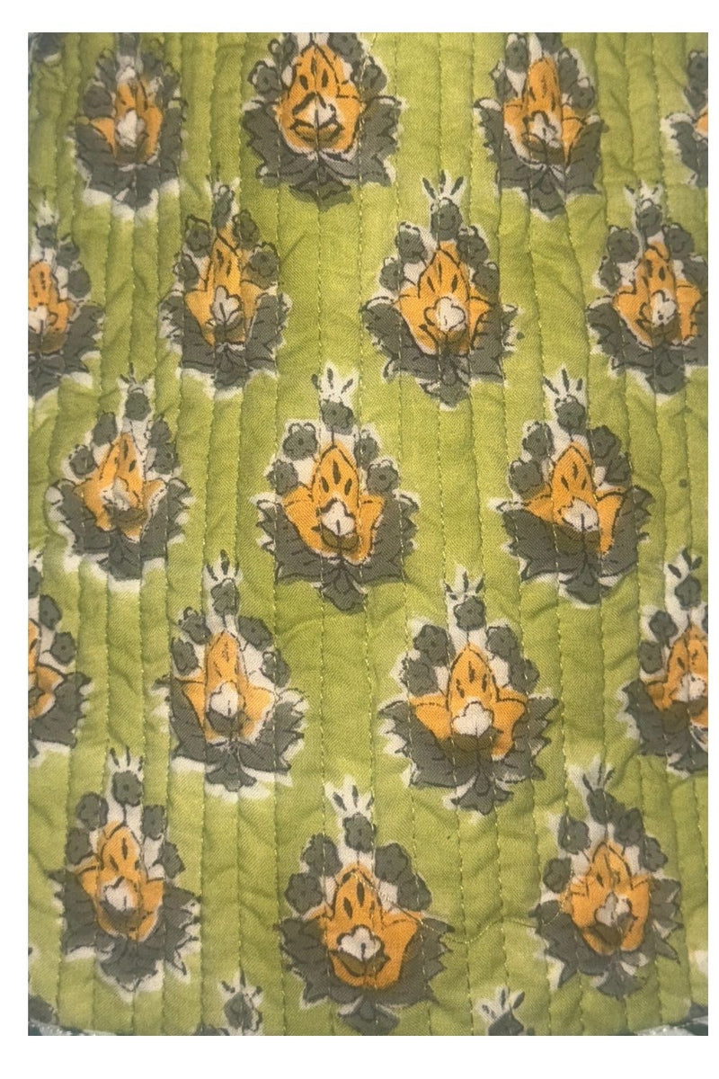yellow and green block printed detail