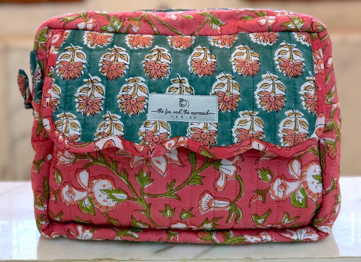 Set of three block print toiletry bags in small, medium and large sizes for travel organization