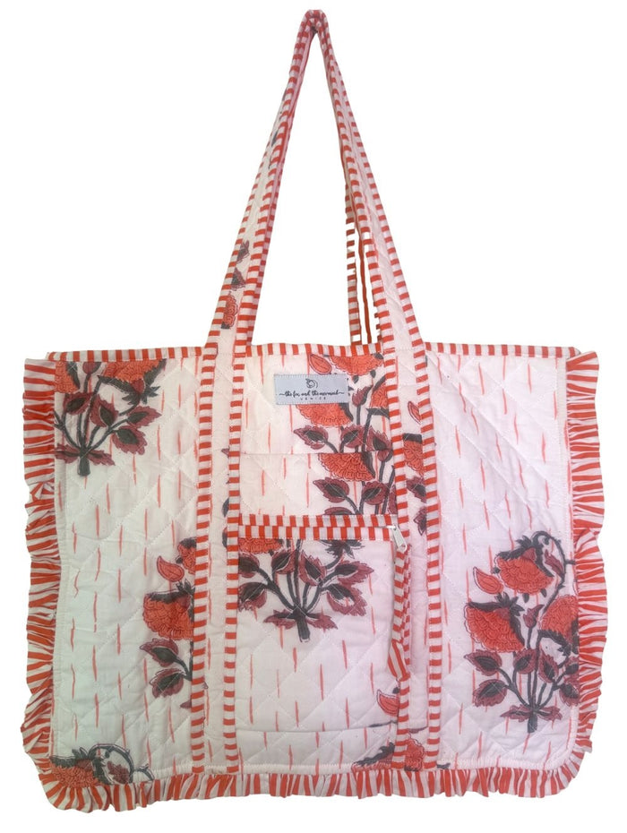 soft block printed cotton bag with ruffle details, flower, and orange stripes