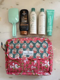 orange hand block printed cosmetic bag set showing large size fits full-size toiletries