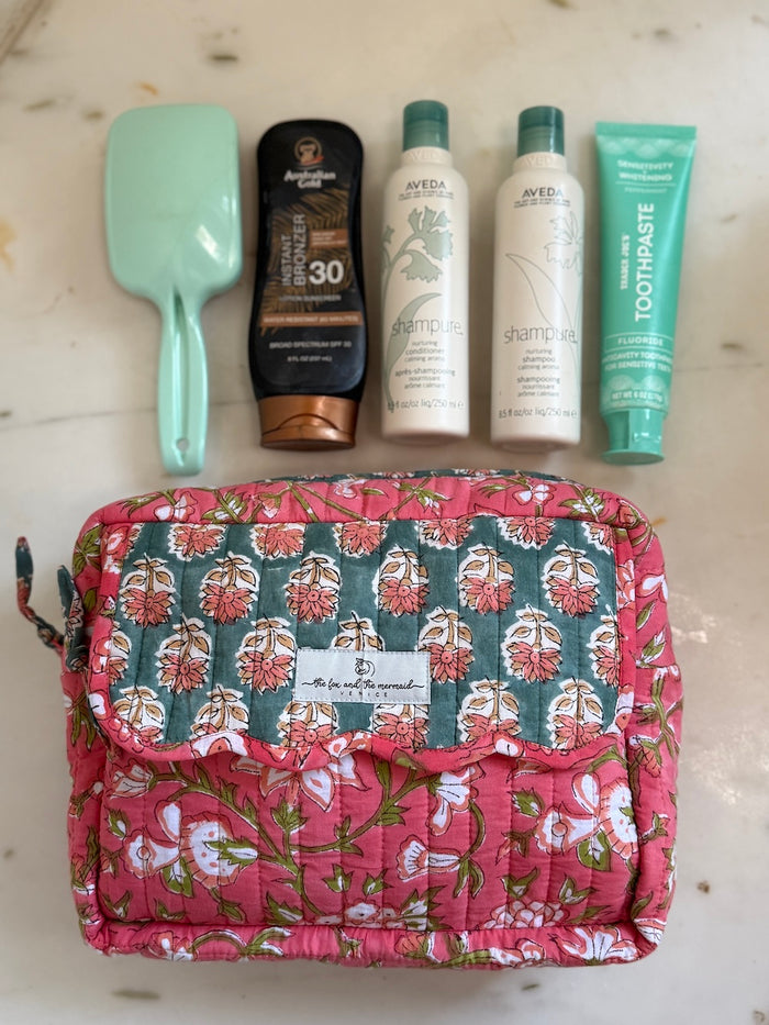 orange hand block printed cosmetic bag set showing large size fits full-size toiletries