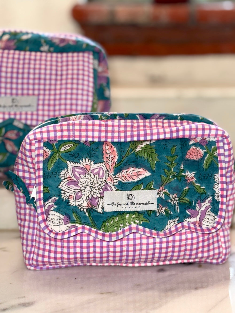 Set of three block print toiletry bags in small, medium and large sizes for travel organization