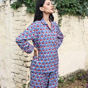 blue pjs with red flowers  - The Fox and the Mermaid